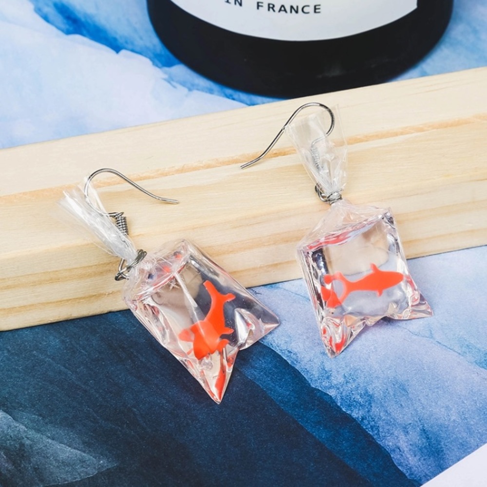 Unique gold fish bag earrings 🐠